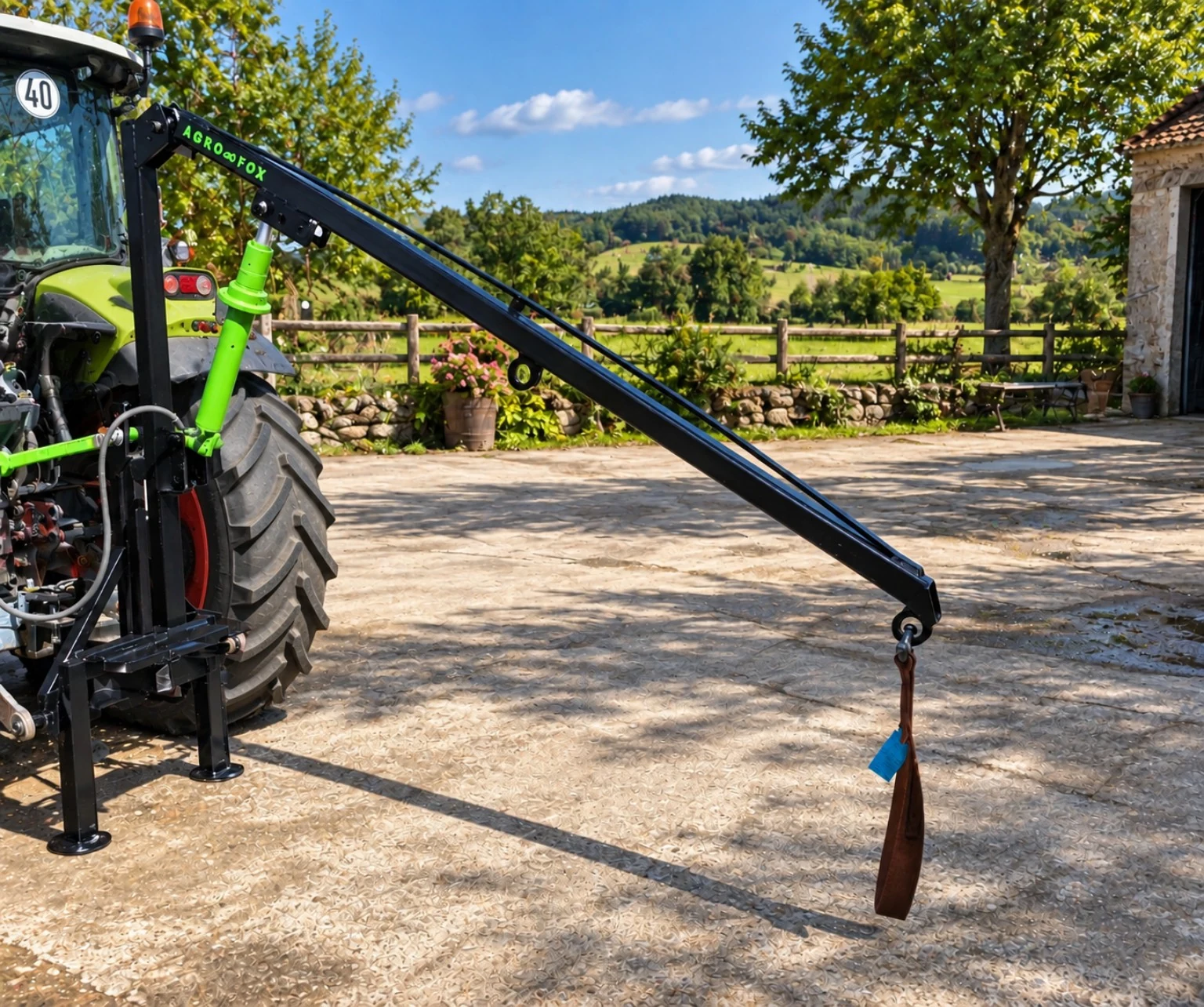 Pluma hidráulica AGRO-FOX instalada en tractor